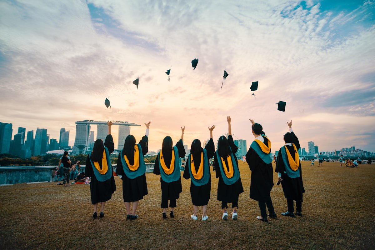 International university graduates celebrating at an Australian graduation ceremony